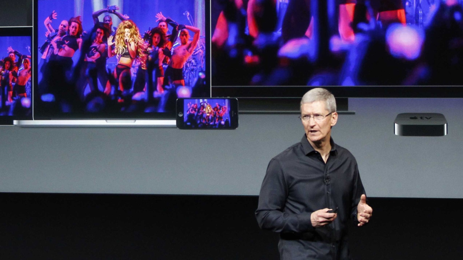 Apple CEO Tim Cook and iTunes