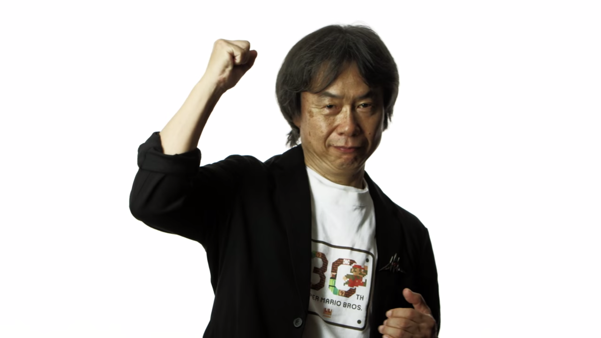 KoopaTV: Shigeru Miyamoto Eats a Hamburger To Prove His Point
