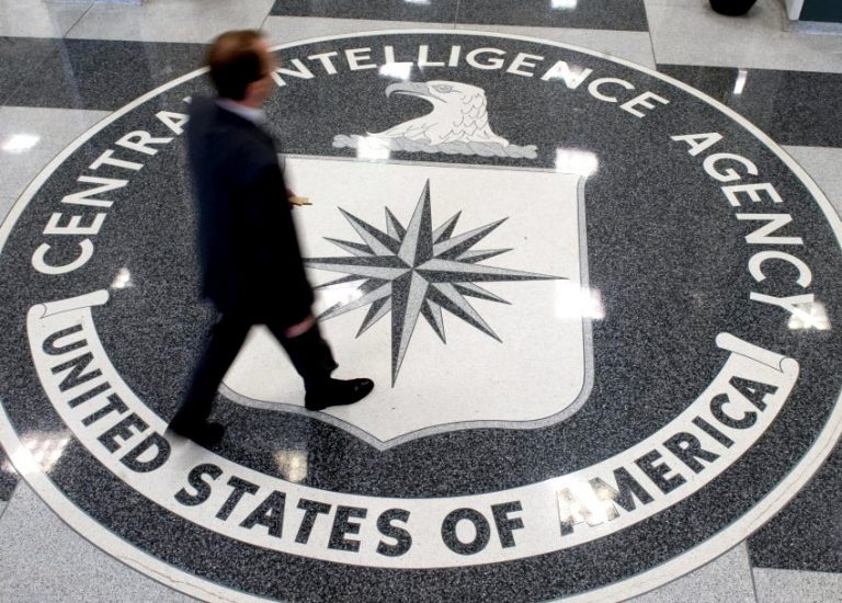 A man walks over the seal of the Central Intelligence Agency (CIA) in the lobby of CIA Headquarters in Langley, Virginia, on August 14, 2008. Gen. Michael Hayden, who was replaced as CIA chief earlier this year by President Barack Obama, assailed Obama's decision last week to release "Top Secret" memos detailing the interrogation techniques as "really dangerous" for US intelligence efforts. Speaking on the "Fox News Sunday" program, on April 19, 2009 Hayden rejected claims by critics that methods like extreme sleep deprivation, waterboarding and the use of insects to provoke fear had proved ineffective in getting information from top members of the Al-Qaeda terrorist network. AFP PHOTO/SAUL LOEB/FILES