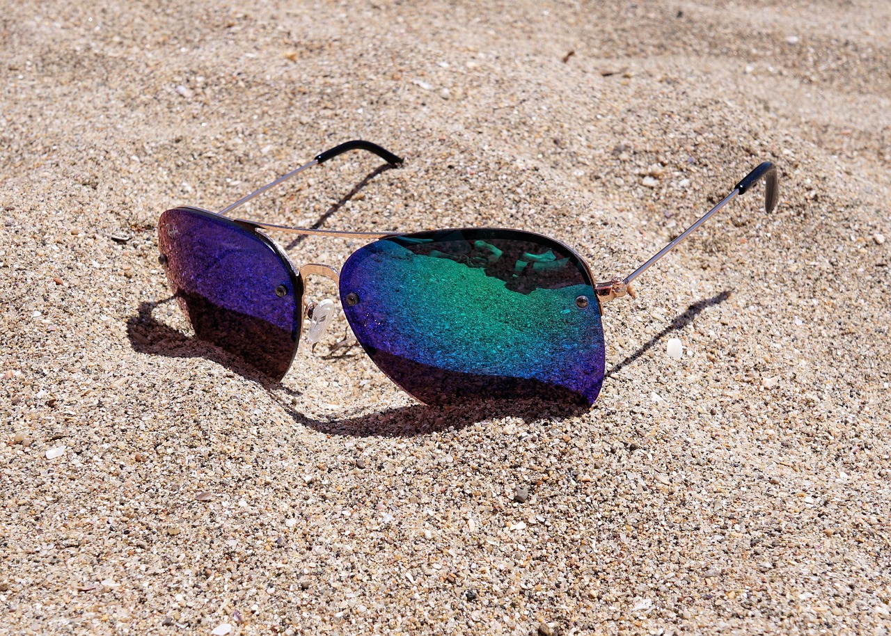 sunglasses sand