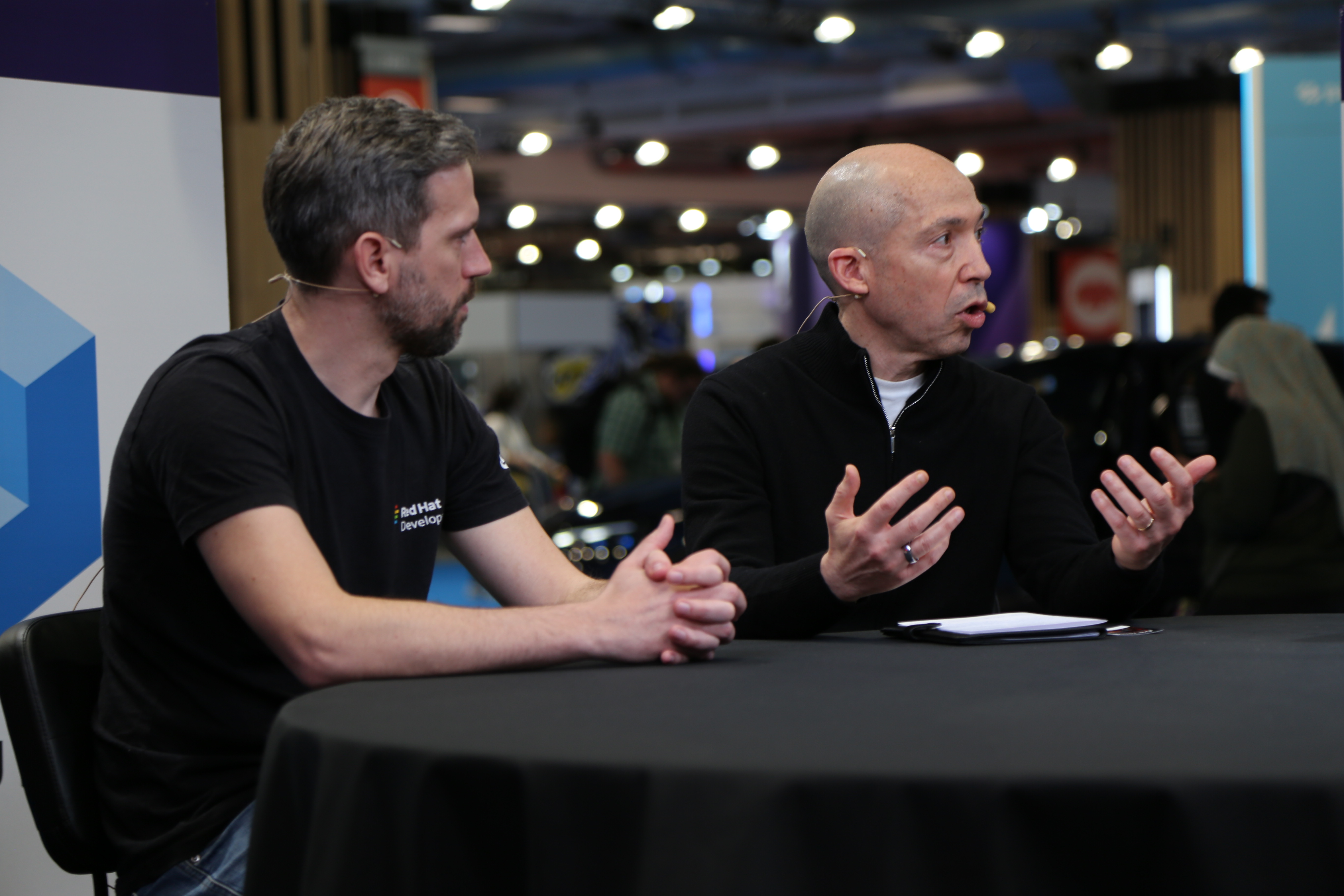 Ignacio Riesgo, senior director of developer marketing and strategy at Red Hat Inc., and Kevin Dubois (left), principal developer advocate at Red Hat, talks with theCUBE during KubeCON EU about the importance of tackling the cognitive load headache that developers face since it hinders productivity