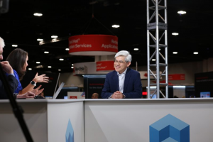 Francis Chow, vice president and general manager of in-vehicle operating system and edge at Red Hat Inc., talks with theCUBE during Red Hat Summit 2024 about revolutionizing the automobile industry.