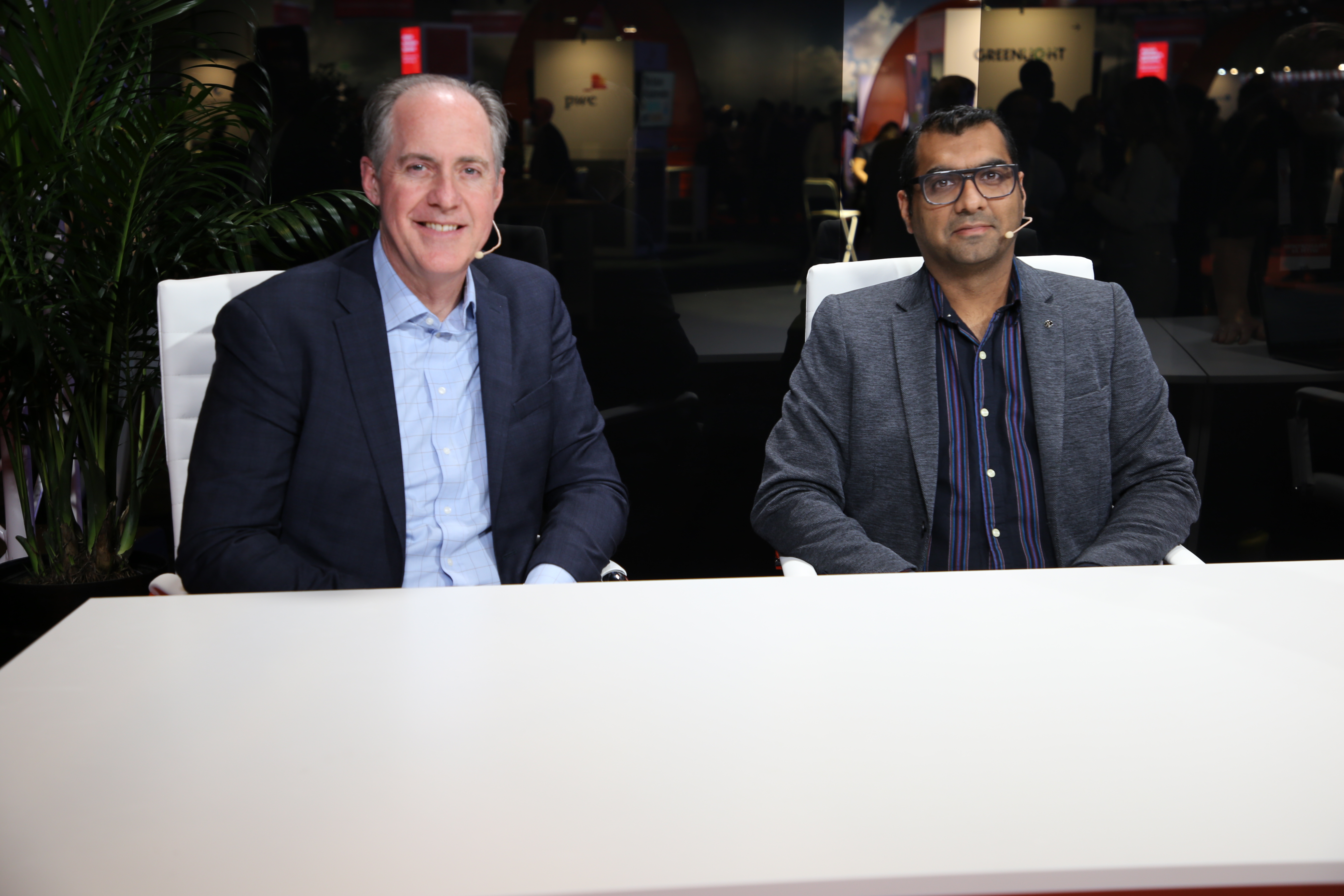 Vivek Valecha, associate vice president of intelligent automation at Persistent Systems, and Derek Downs, head of channels and alliances at OutSystems – UiPath FORWARD 2024