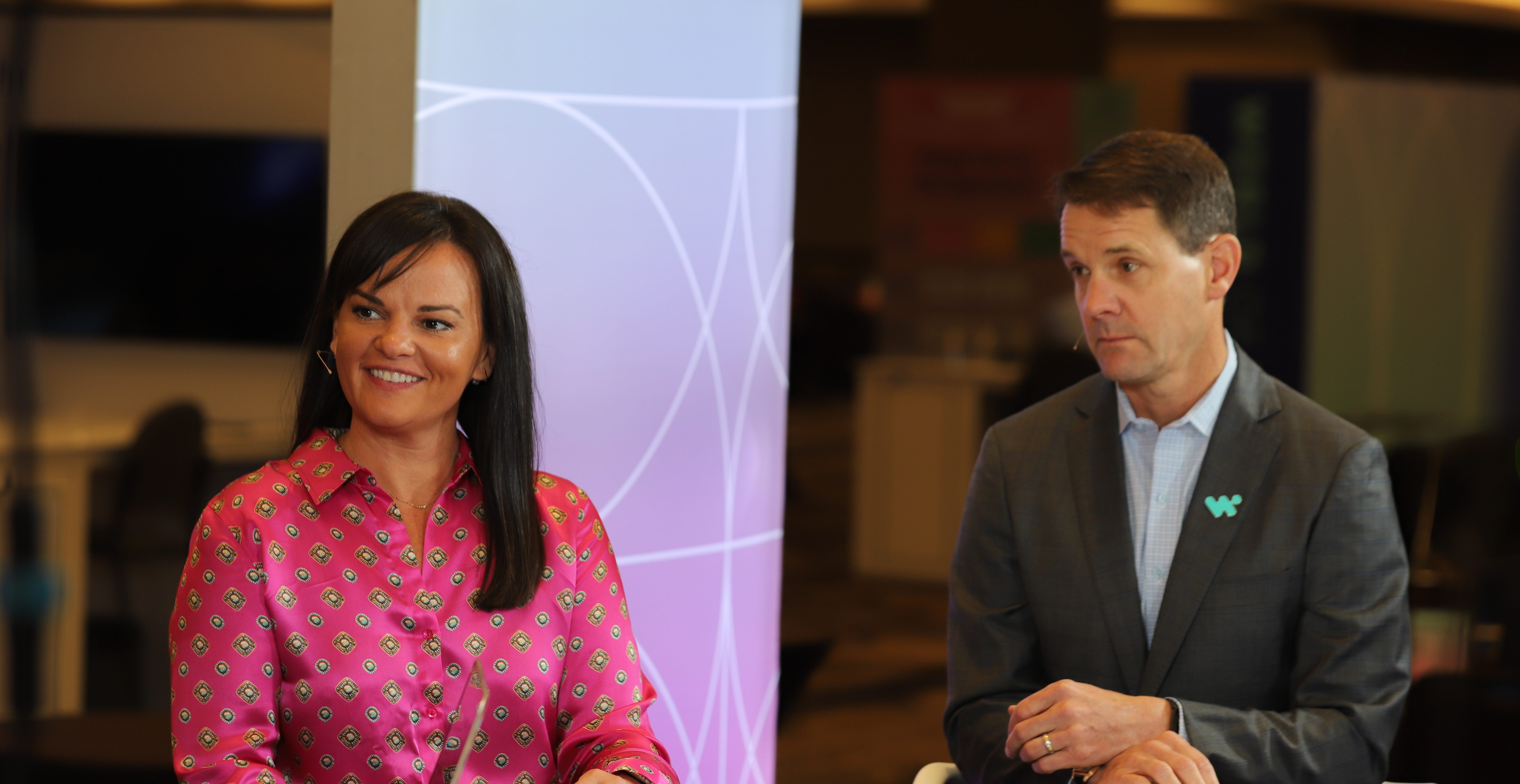 Carter Busse, CIO of Workato, and Stephanie Dwight, VP of business technology at Workato, talk to theCUBE about AI governance at the WOW: World of Workato event.