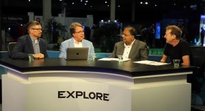 Kumaran Siva (left), corporate vice president of strategic business development at Advanced Micro Devices Inc. and Paul Turner, vice president of products, VMware Cloud Foundation Division, at Broadcom Inc., talk with theCUBE about GPU virtualization – VMware Explore 2025.
