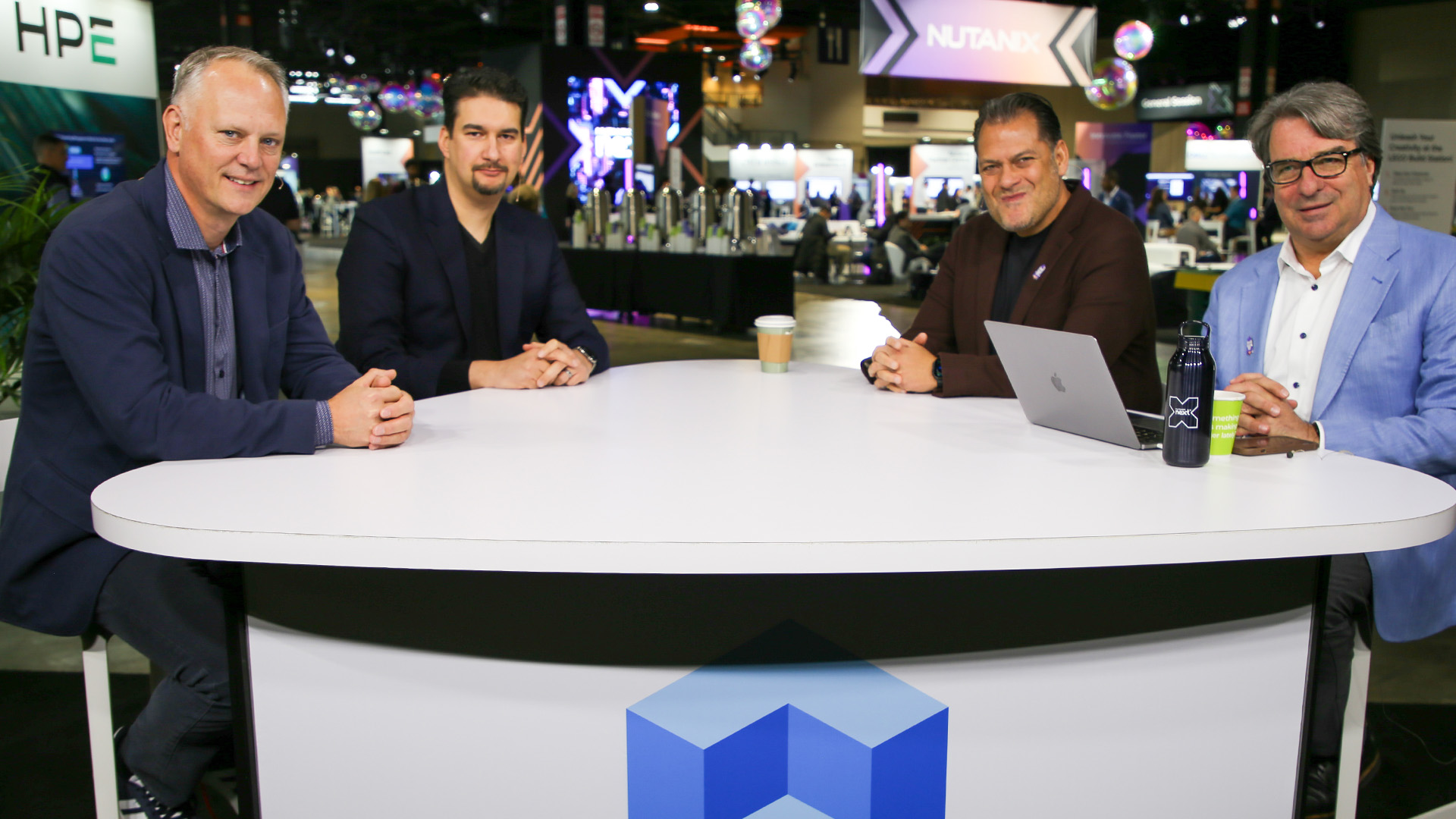 Scott Manchester, CPTO at Nerdio, Saud Al-Mishari, principal group product manager at Microsoft, and Tarkan Maner, president and CCO of Nutanix, discuss their partnership and hybrid EUC. — Nutanix .NEXT 2026