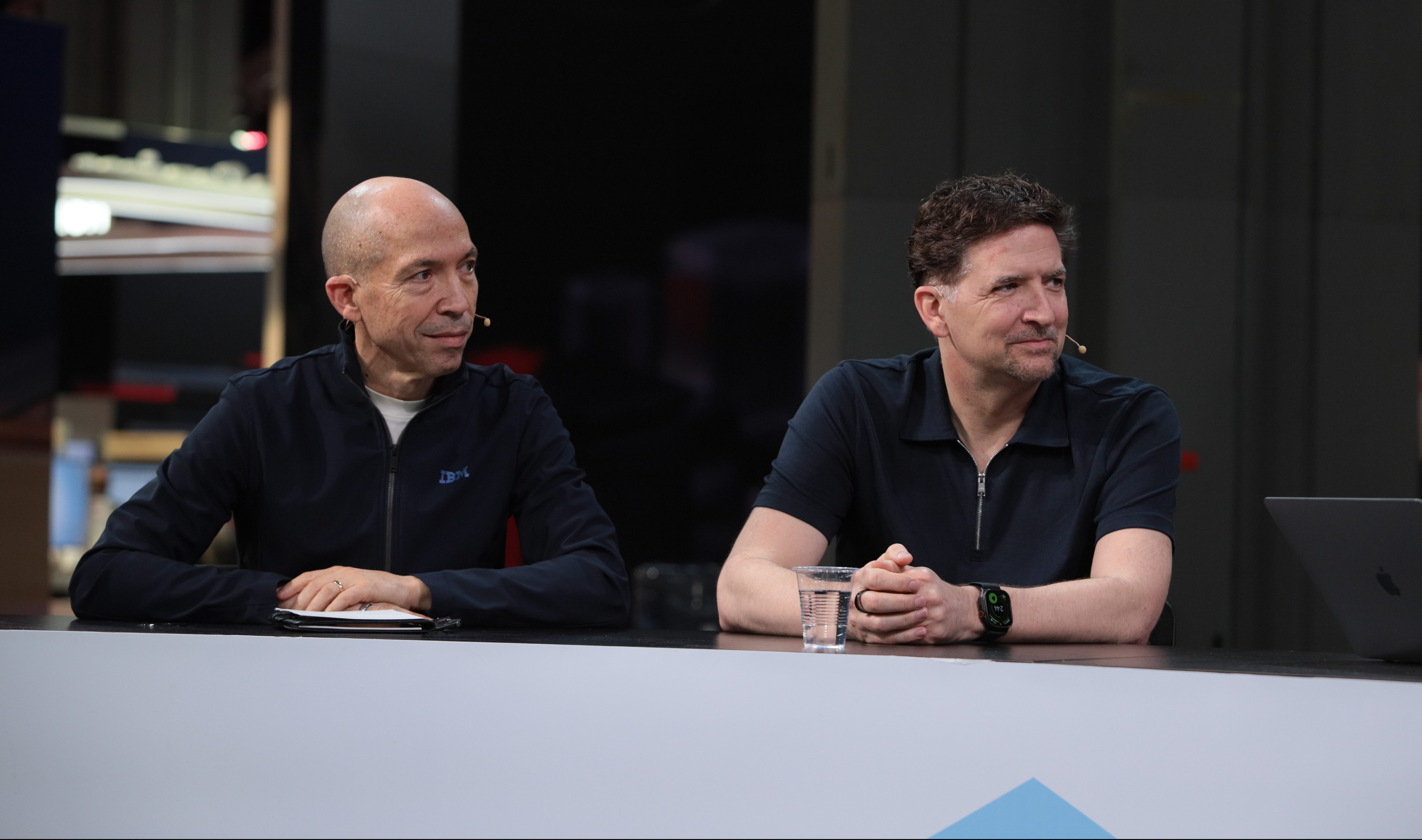 Ignacio Riesgo, senior director for developer advocacy, IBM and Red Hat application development, at IBM Corp and Jason McGee, IBM fellow, chief technology officer for IBM cloud at IBM, discussed enterprise AI architecture during Red Hat Summit 2026.